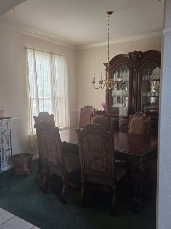 606 Point Run Drive Pflugerville, TX 78660 - Photo 5 of 14 a view of a dining room with furniture and window