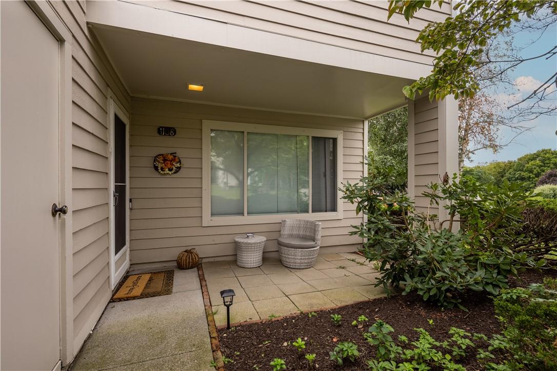 1108 Eagles Ridge Road Brewster, NY 10509 - Photo 1 of 1 End unit View of patio in front of home