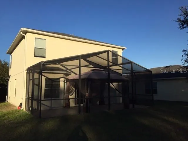 a view of outdoor space with deck and yard