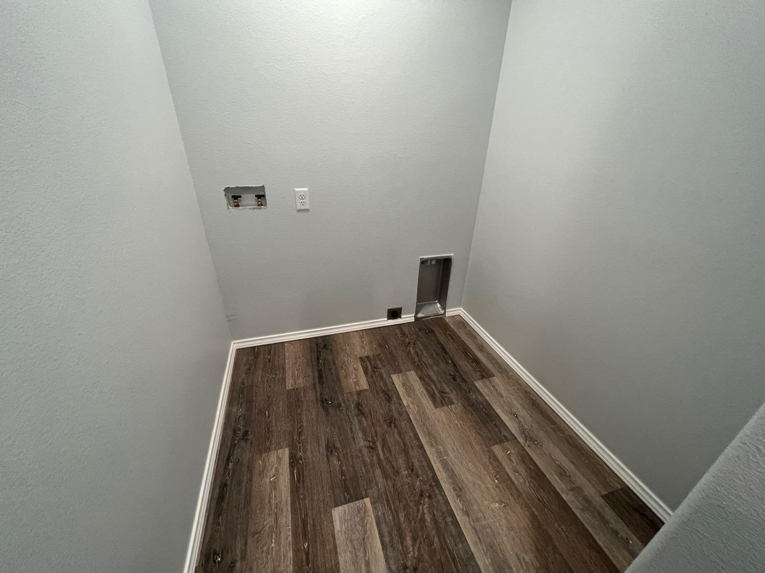 5611 Jarvis Street, Unit B Lubbock, TX 79416 - Photo 13 of 20 a view of wooden floor