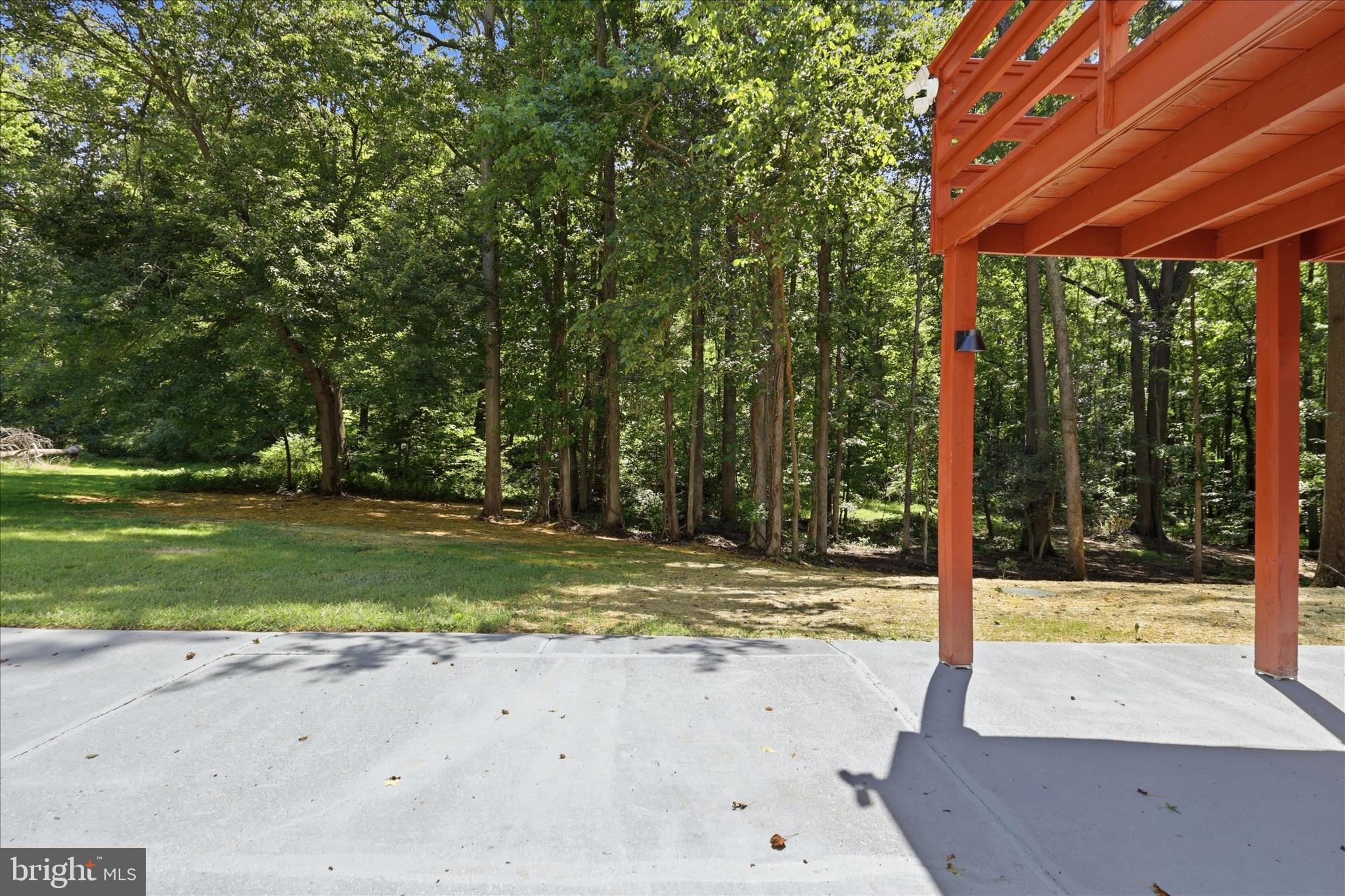 8855 Lowell Road Pomfret, MD 20675 - Photo 36 of 48 Lower level suite patio