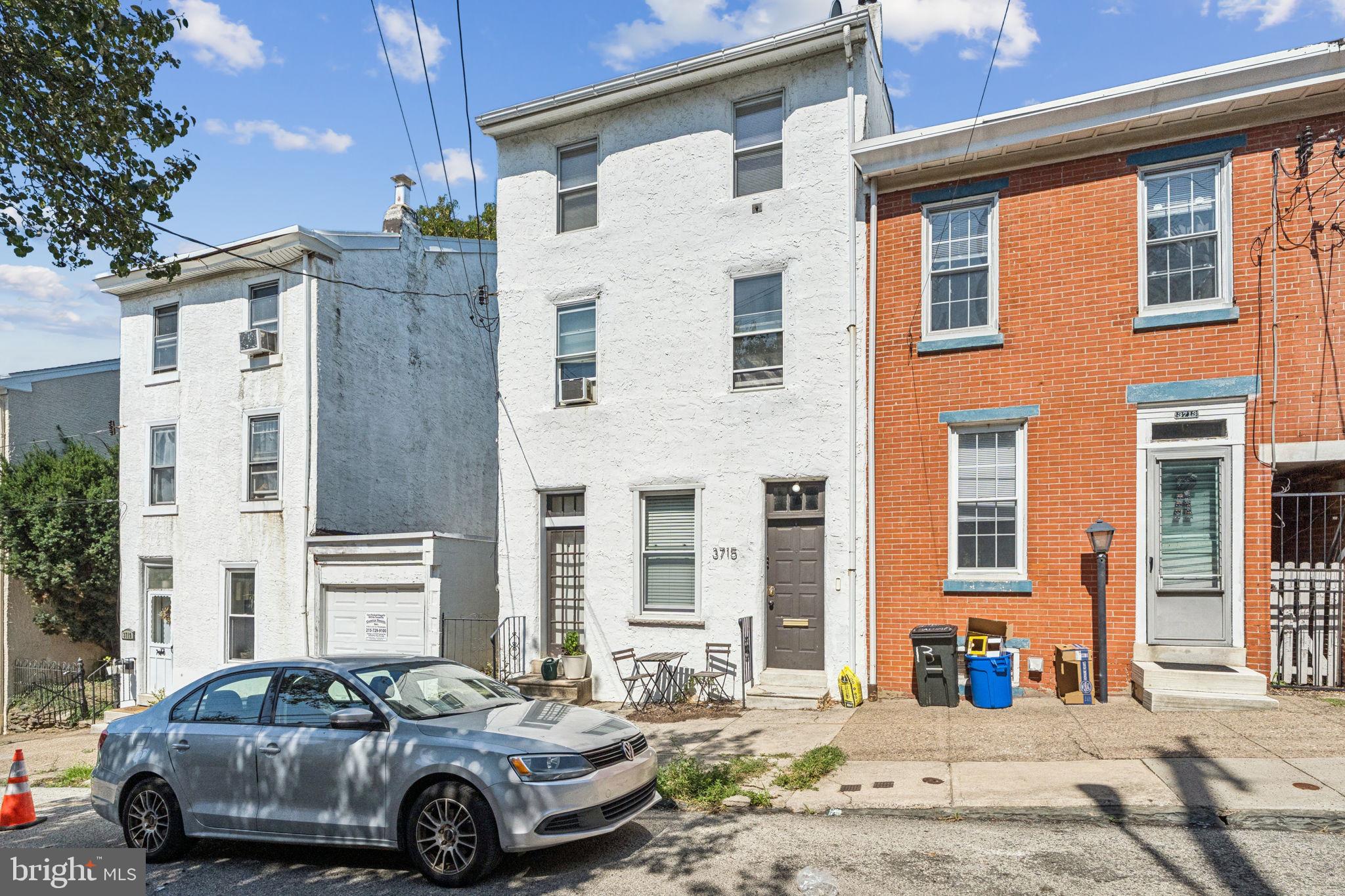 3715 Calumet Street, Unit 3 Philadelphia, PA 19129 - Photo 18 of 19 a front view of a house with parking space