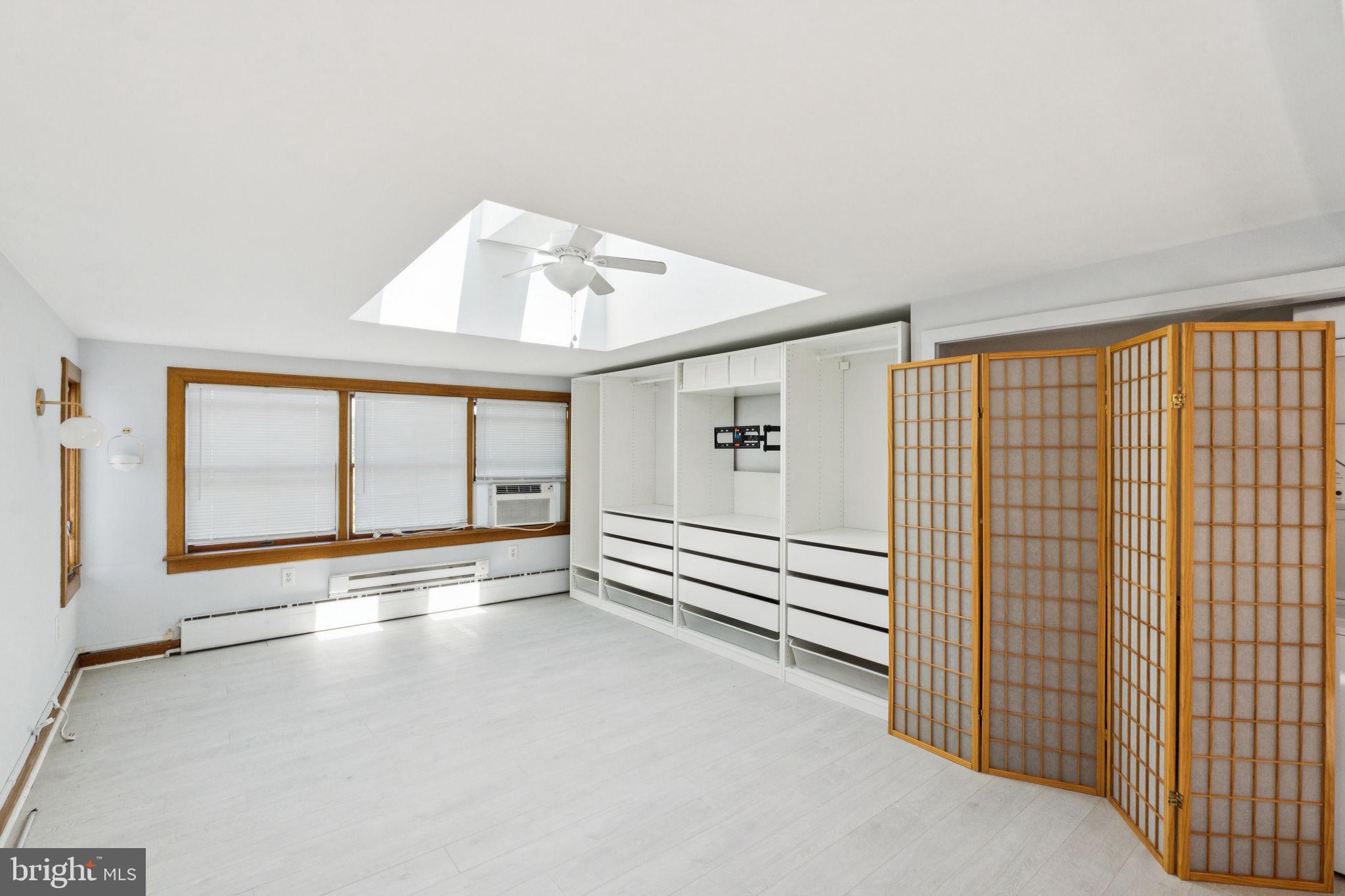 3715 Calumet Street, Unit 3 Philadelphia, PA 19129 - Photo 6 of 19 a view of an empty room with a window