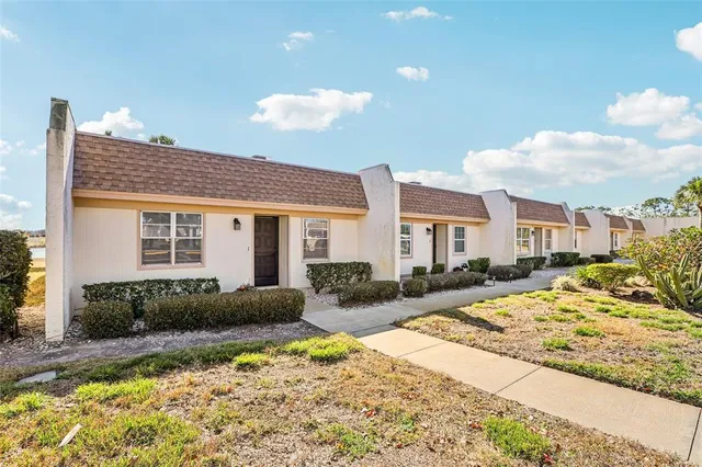 a view of a house with a patio