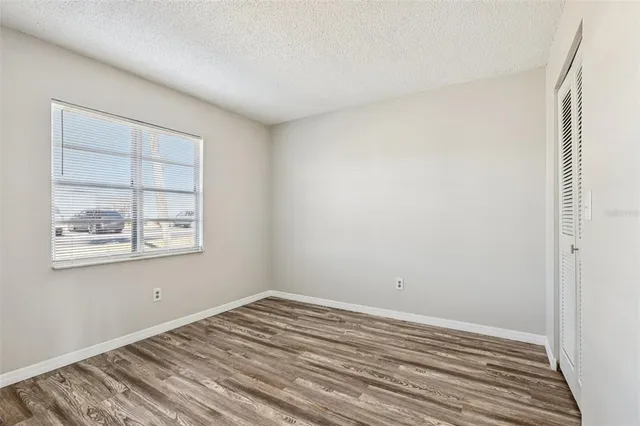 a view of a room that has a window in it