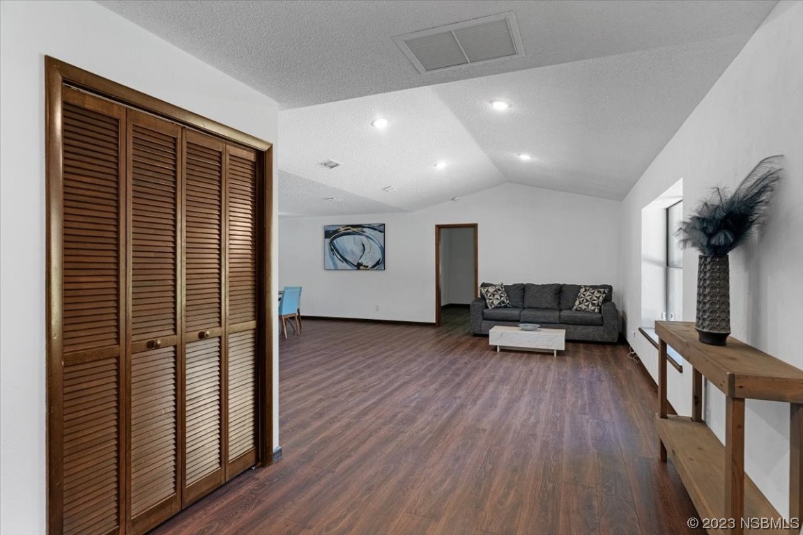 6202 Yellowstone Drive Port Orange, FL 32127 - Photo 11 of 34 a view of a livingroom with furniture and a flat screen tv