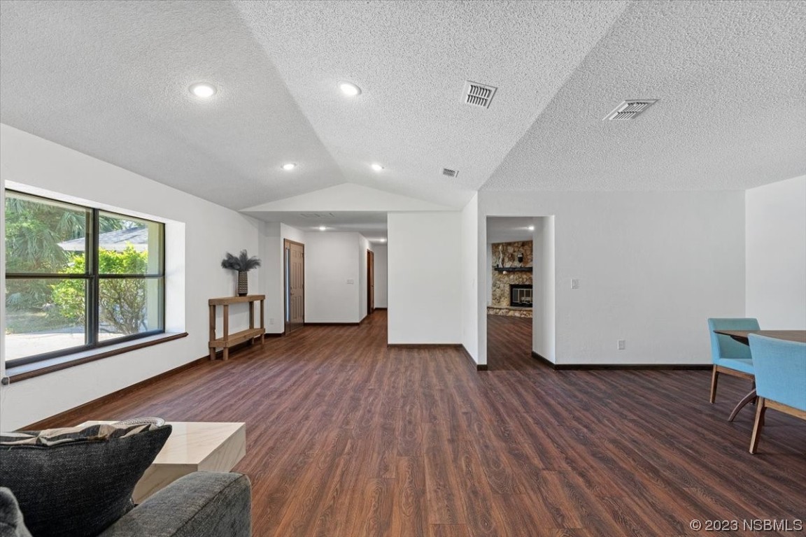 6202 Yellowstone Drive Port Orange, FL 32127 - Photo 31 of 34 a view of an empty room with wooden floor and a window