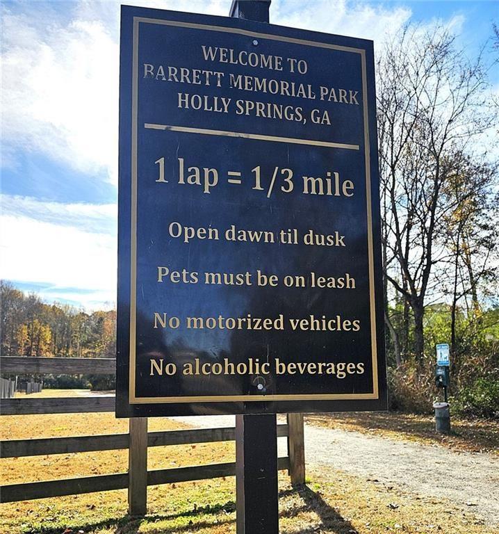 303 Apache Drive Canton, GA 30115 - Photo 18 of 19 a sign on the side of a building