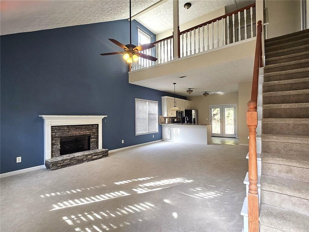 303 Apache Drive Canton, GA 30115 - Photo 2 of 19 a view of a livingroom with a fireplace