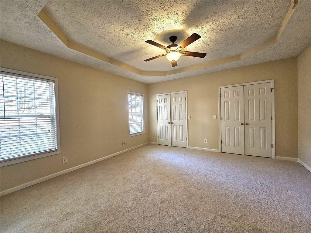 303 Apache Drive Canton, GA 30115 - Photo 8 of 19 a view of an empty room with a window