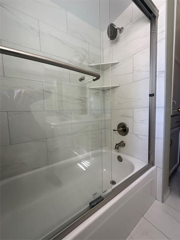 4342 Timberglen Road Dallas, TX 75287 - Photo 22 of 27 Full bathroom with shower / bath combination with glass door