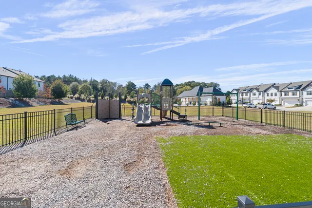 a view of a swimming pool with a garden