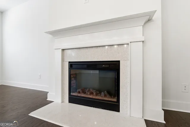 a living room with a fireplace