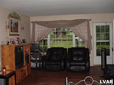1608 Donalds Road Effort, PA 18330 - Photo 8 of 9 a room with furniture and a window