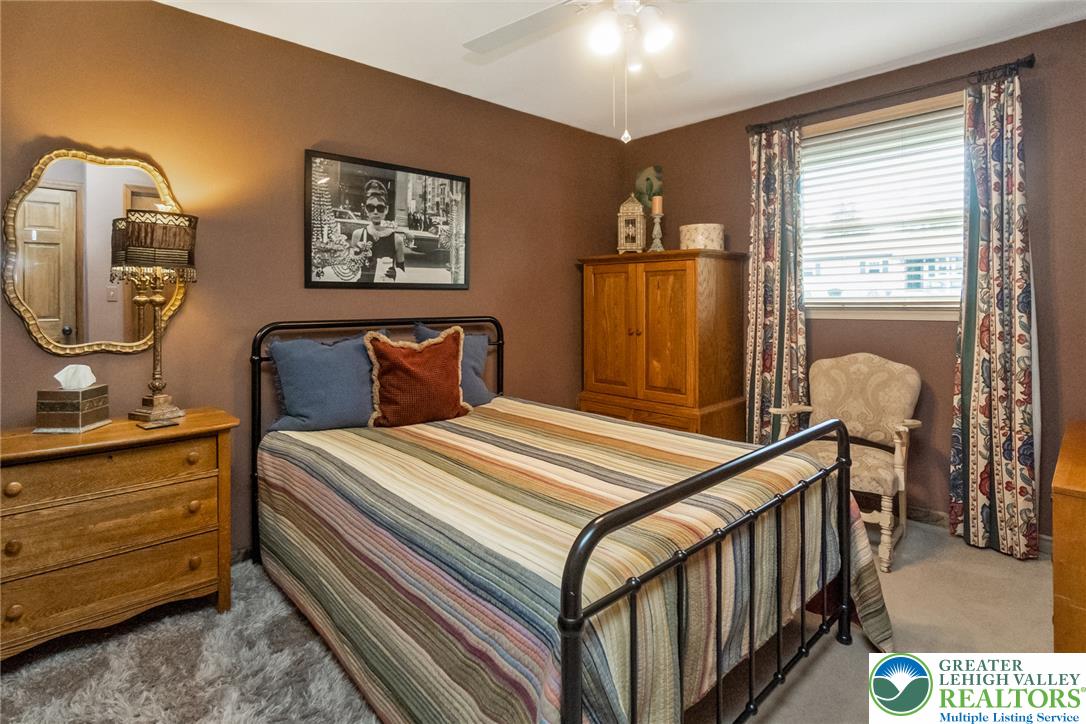 540 Briar Road Pen Argyl, PA 18072 - Photo 34 of 66 A comfortable bedroom featuring a sturdy metal bed frame and window blinds for adjustable light.