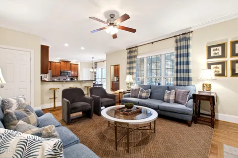 a kitchen with stainless steel appliances granite countertop a stove a refrigerator and a microwave