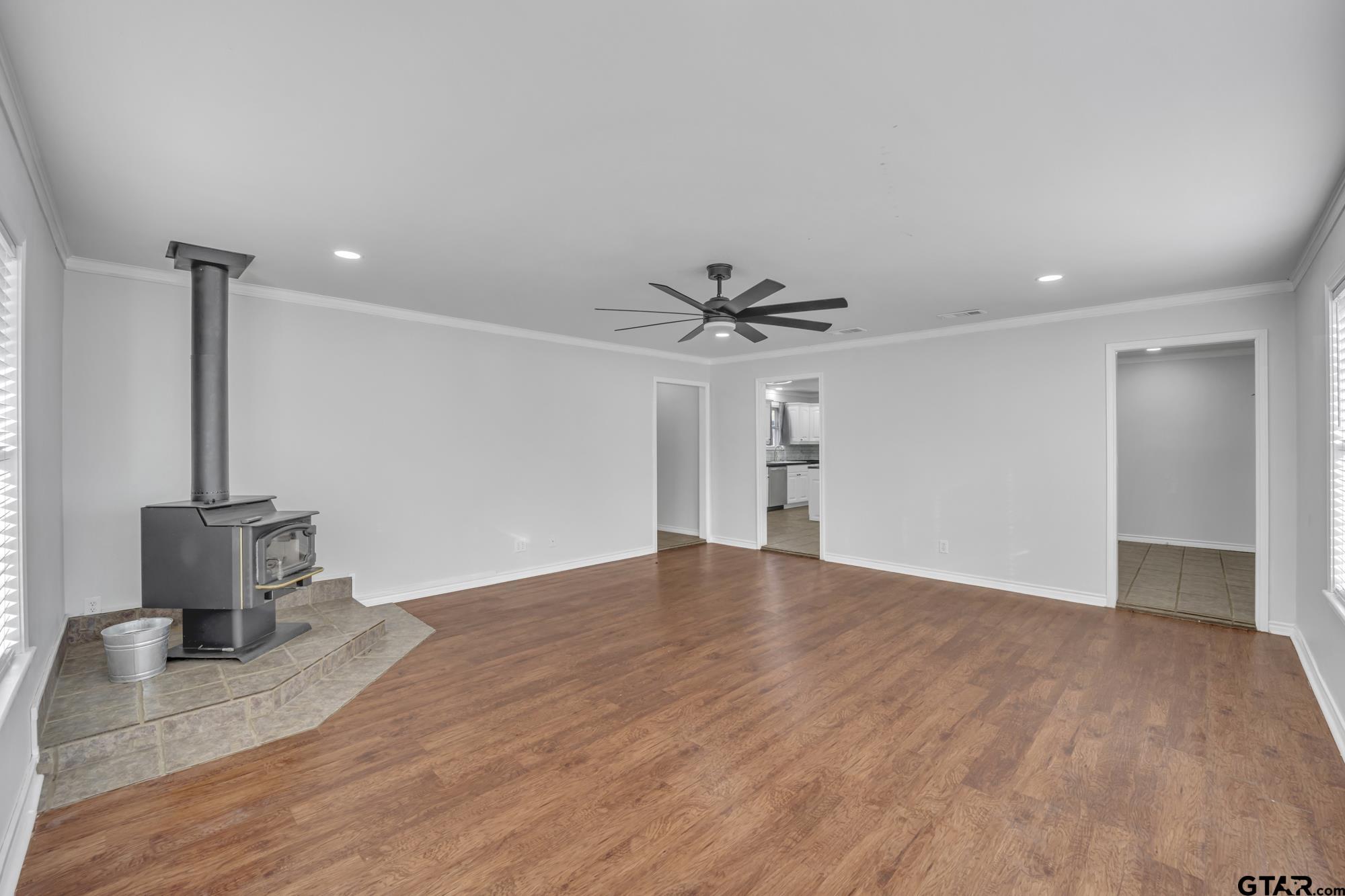 3743 Smelley Road Longview, TX 75605 - Photo 5 of 25 a view of an empty room with a window