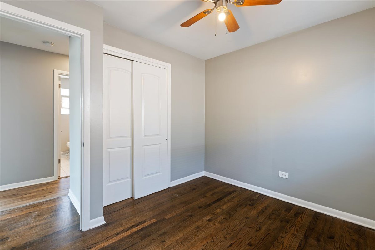 15304 Grant Street Dolton, IL 60419 - Photo 18 of 32 wooden floor in an empty room