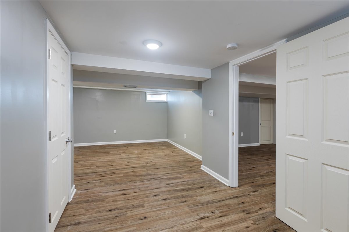 15304 Grant Street Dolton, IL 60419 - Photo 26 of 32 a view of an empty room with wooden floor