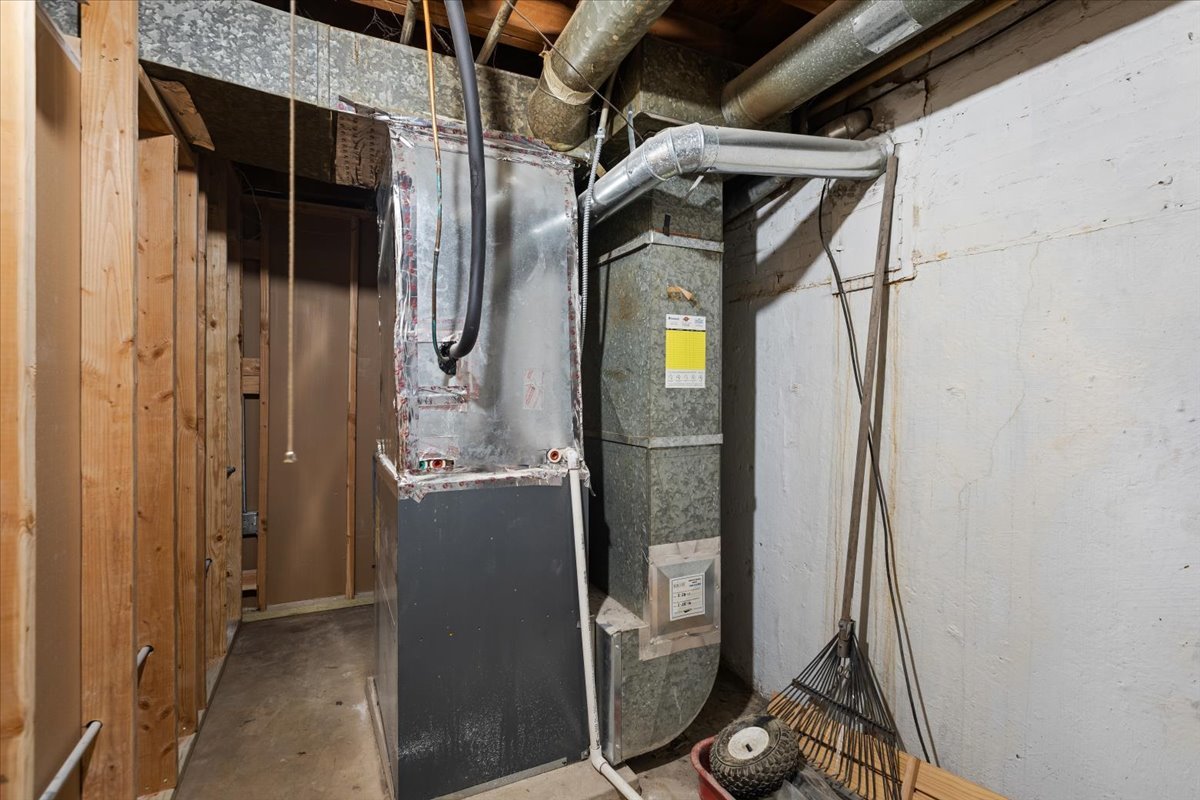 15304 Grant Street Dolton, IL 60419 - Photo 29 of 32 a view of storage and utility room