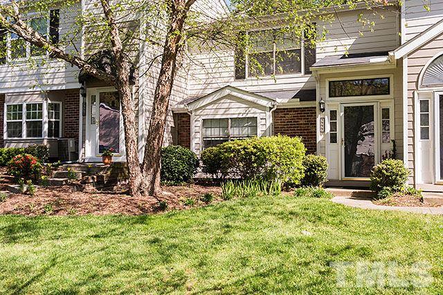 7777 Falcon Rest Circle Raleigh, NC 27615 - Photo 1 of 24 a front view of a house with a yard