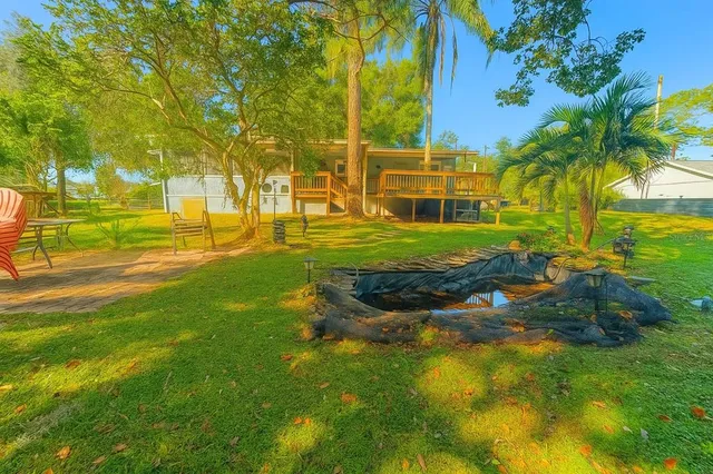 a view of a park with a houses