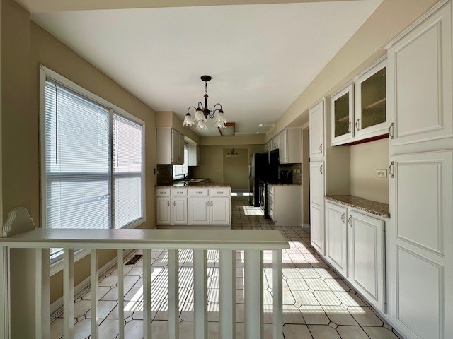 2301 Modaff Road Naperville, IL 60565 - Photo 12 of 24 a view of a kitchen with a sink and dishwasher kitchen view