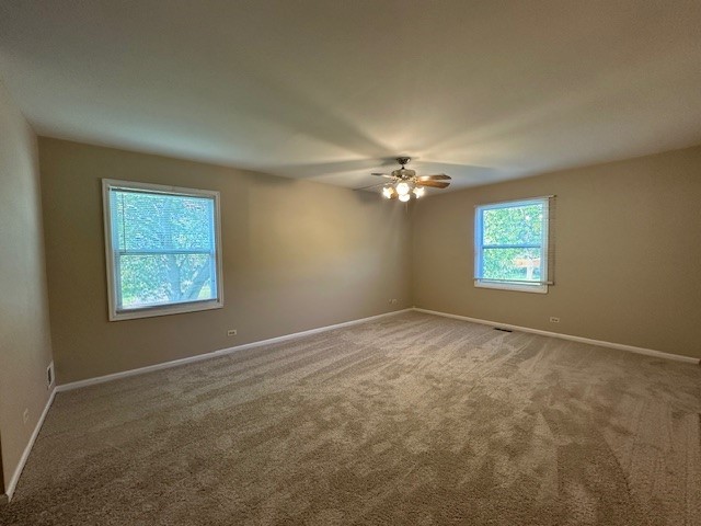 2301 Modaff Road Naperville, IL 60565 - Photo 14 of 24 a view of an empty room with a window