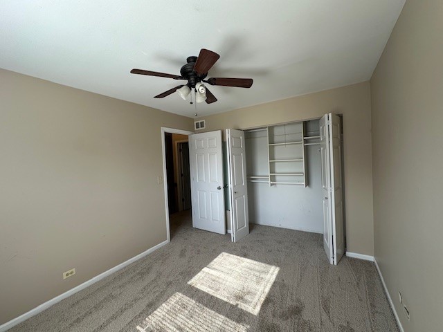 2301 Modaff Road Naperville, IL 60565 - Photo 22 of 24 a view of a big room with wooden floor and windows