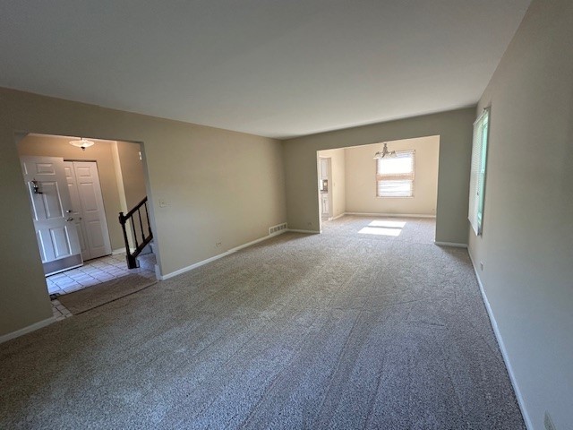 2301 Modaff Road Naperville, IL 60565 - Photo 4 of 24 a view of a livingroom with wooden floor and a window