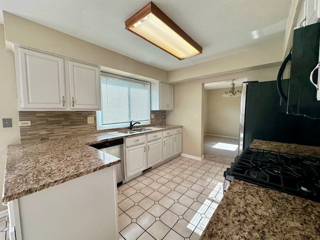 2301 Modaff Road Naperville, IL 60565 - Photo 7 of 24 a kitchen with a sink a stove and cabinets