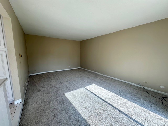 2301 Modaff Road Naperville, IL 60565 - Photo 10 of 24 an empty room with a bench
