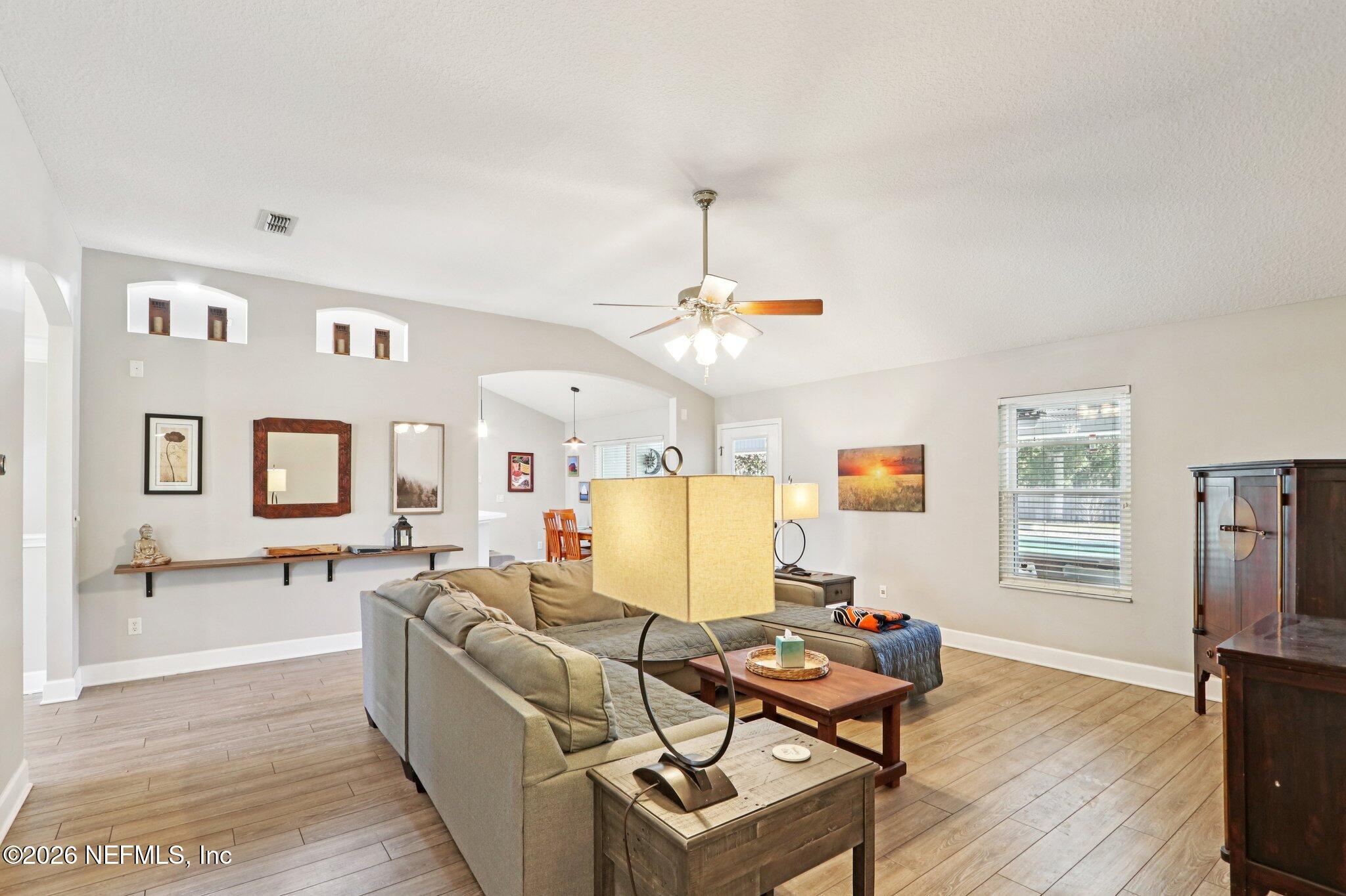 1405 Sinclair Lane Jacksonville, FL 32221 - Photo 13 of 37 a living room with furniture and wooden floor