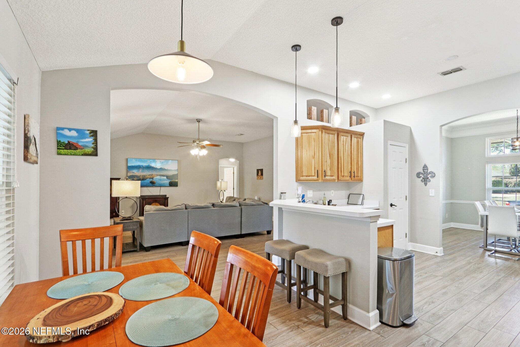1405 Sinclair Lane Jacksonville, FL 32221 - Photo 16 of 37 a large kitchen with a table and chairs