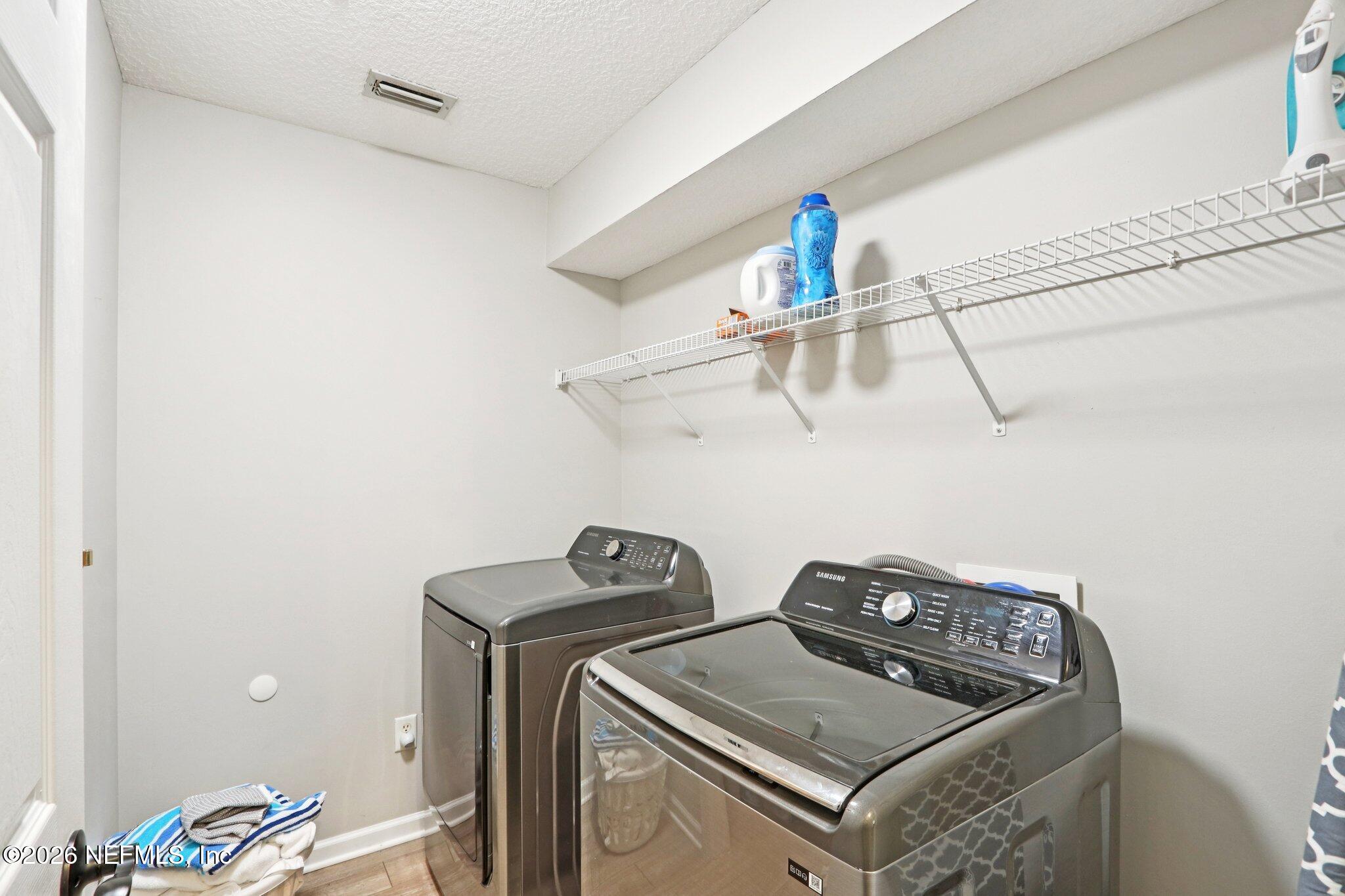 1405 Sinclair Lane Jacksonville, FL 32221 - Photo 30 of 37 a utility room with dryer and washer