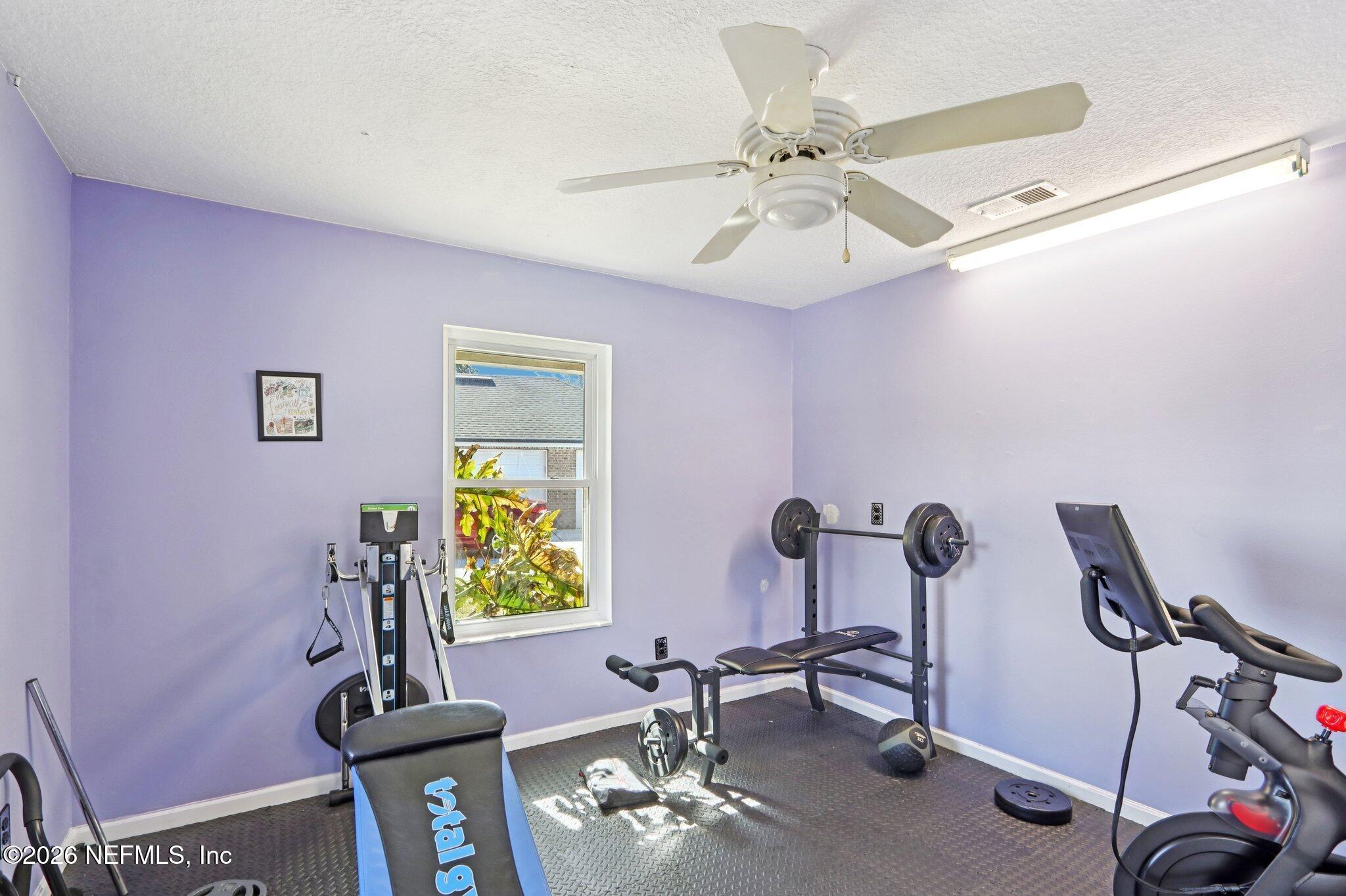 1405 Sinclair Lane Jacksonville, FL 32221 - Photo 33 of 37 a view of a workspace with furniture and a window
