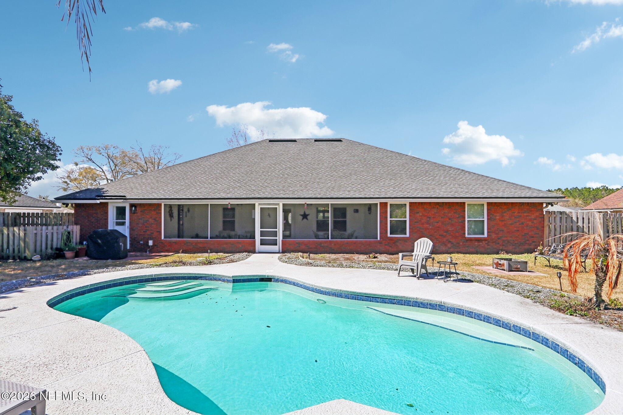 1405 Sinclair Lane Jacksonville, FL 32221 - Photo 36 of 37 a front view of a house with swimming pool having patio