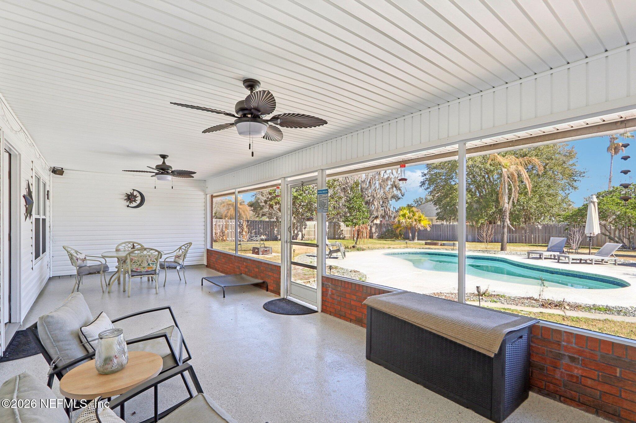 1405 Sinclair Lane Jacksonville, FL 32221 - Photo 7 of 37 a living room with furniture and a large window