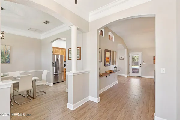 a view of a living room and dining room