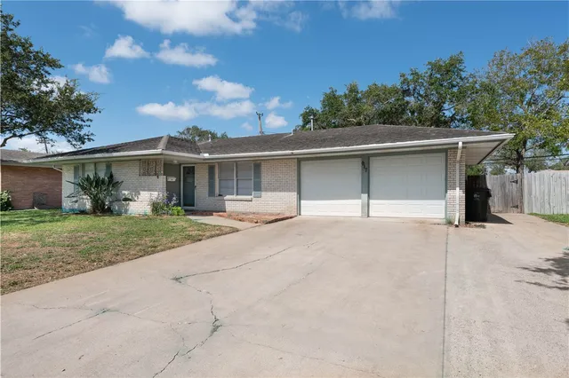front view of house with a yard