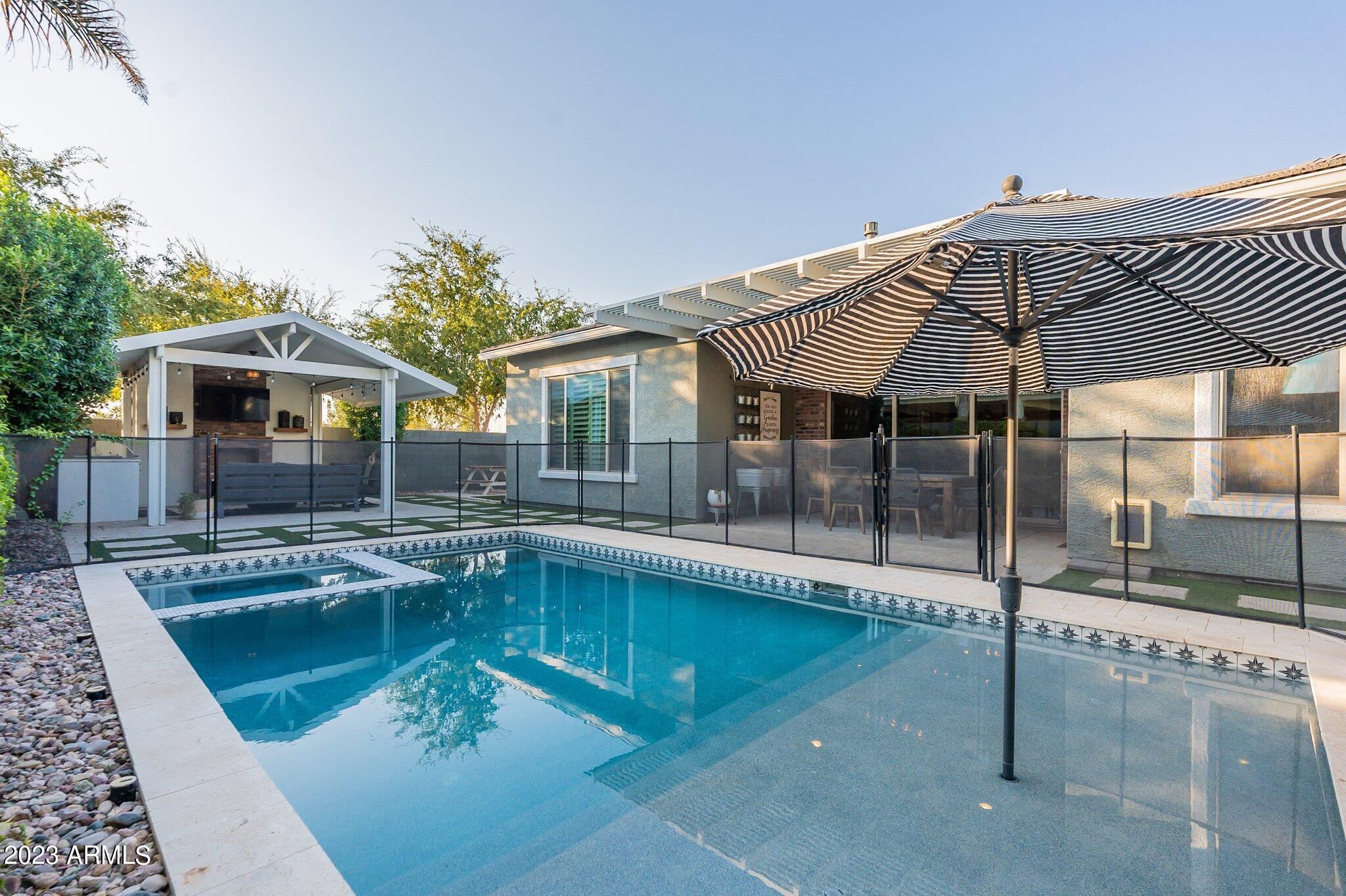 2833 East Appaloosa Road Gilbert, AZ 85296 - Photo 32 of 44 pool with large baja steps