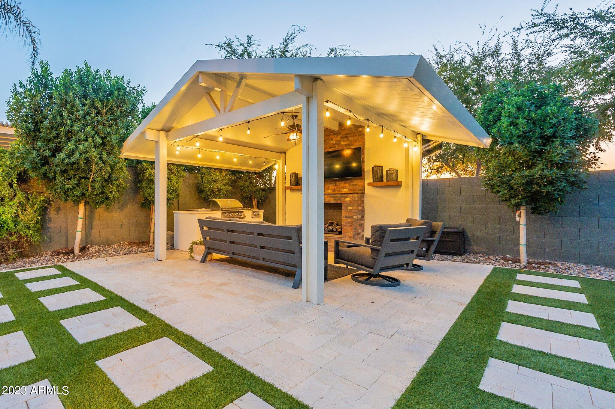 2833 East Appaloosa Road Gilbert, AZ 85296 - Photo 33 of 44 pergola with fireplace and bbq island