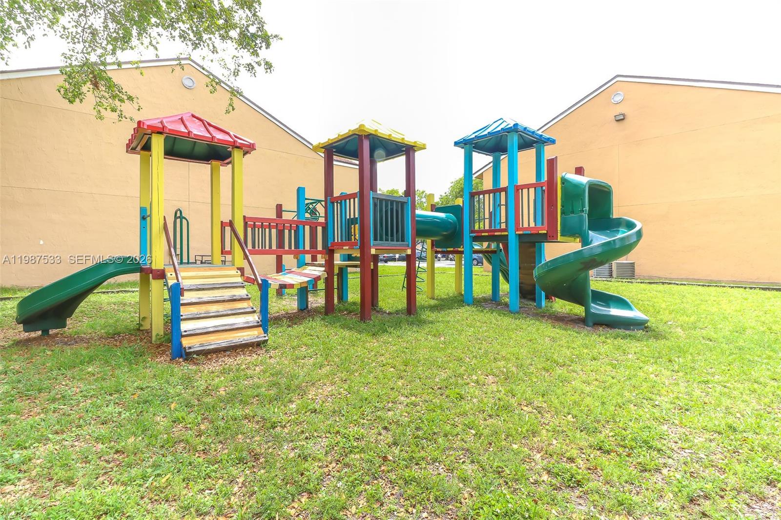 2157 Southwest 80th Terrace, Unit 2157 Miramar, FL 33025 - Photo 18 of 29 a view of a house with a backyard and a patio