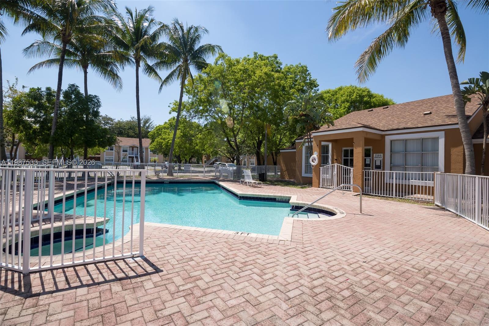 2157 Southwest 80th Terrace, Unit 2157 Miramar, FL 33025 - Photo 20 of 29 a view of a house with swimming pool and sitting area