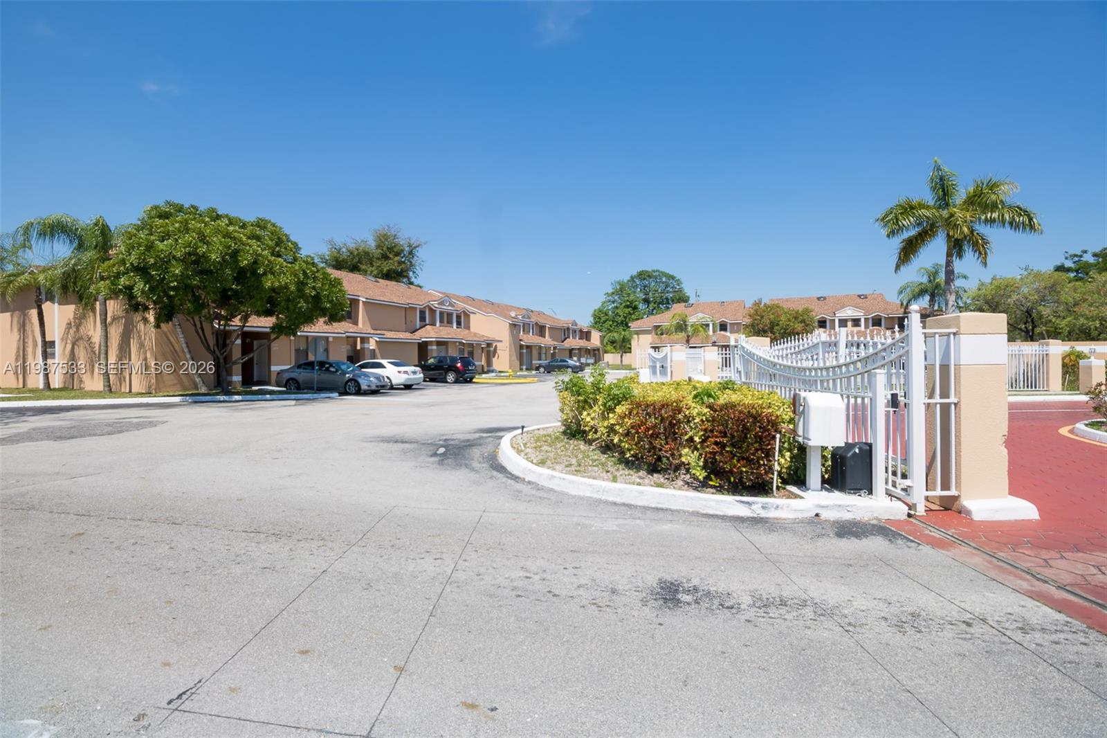 2157 Southwest 80th Terrace, Unit 2157 Miramar, FL 33025 - Photo 25 of 29 a view of a street with a building in the background