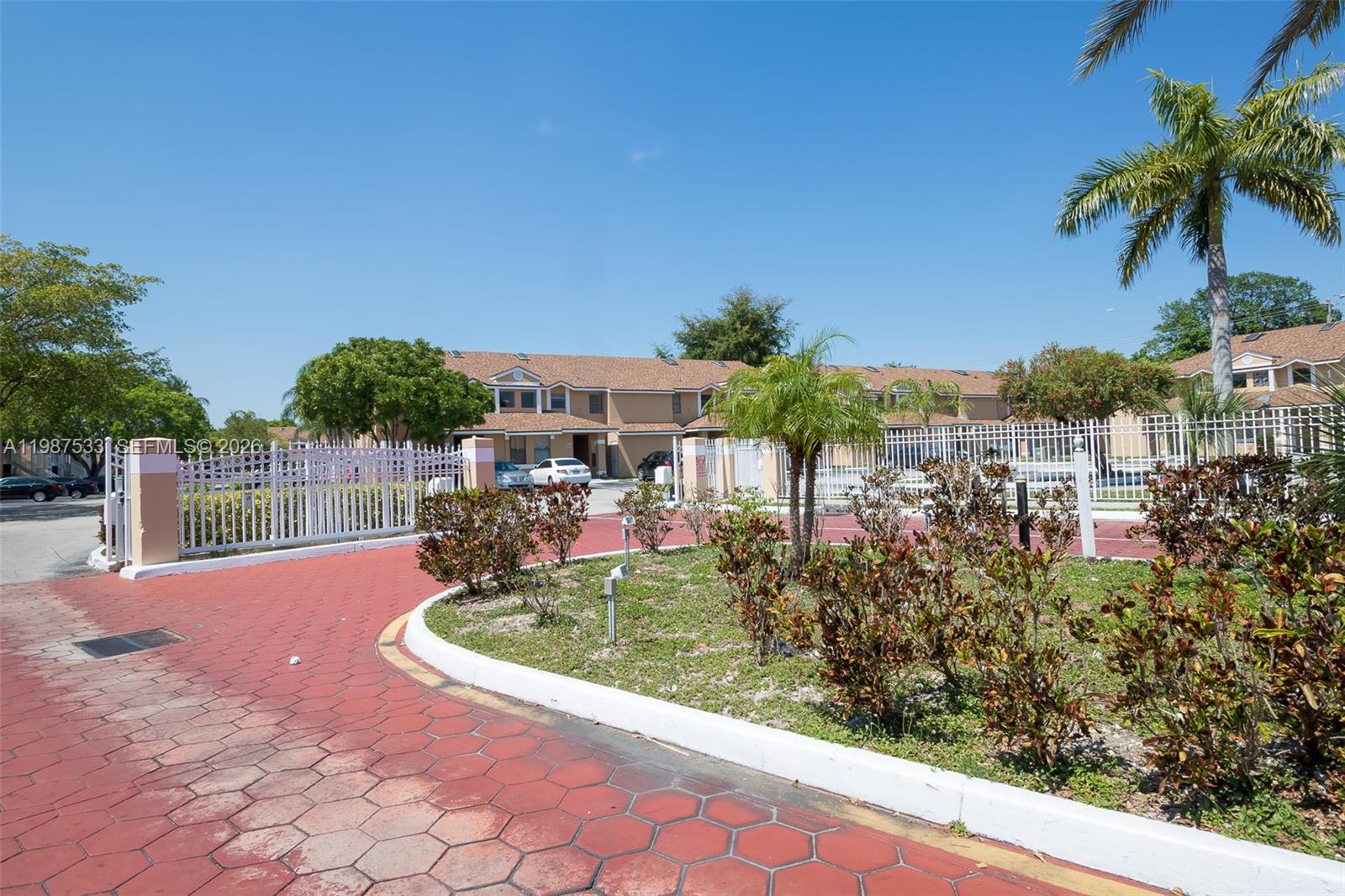 2157 Southwest 80th Terrace, Unit 2157 Miramar, FL 33025 - Photo 26 of 29 a view of a swimming pool with a patio