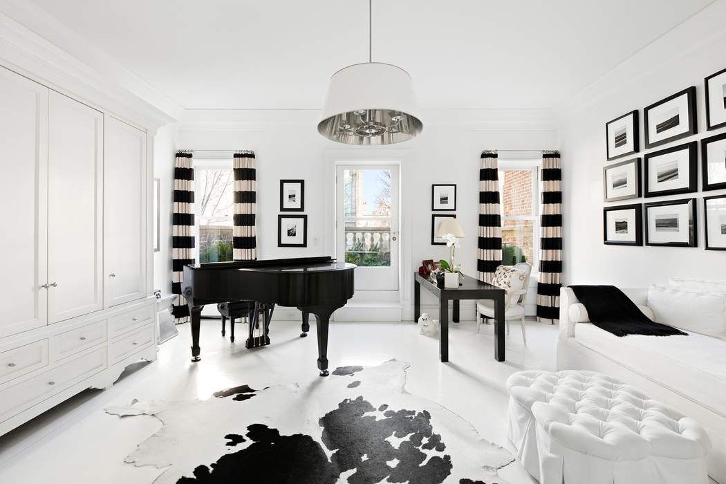10 East 73rd Street Manhattan, NY 10021 - Photo 11 of 16 a view of a livingroom with furniture and window