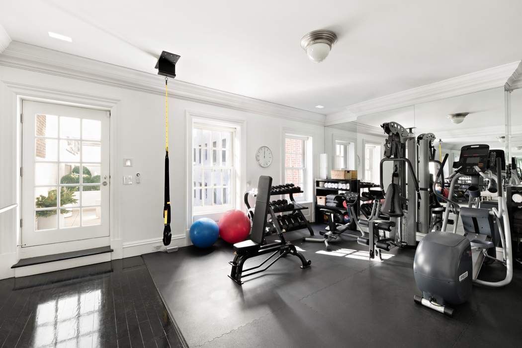 10 East 73rd Street Manhattan, NY 10021 - Photo 14 of 16 a view of a room with gym equipment