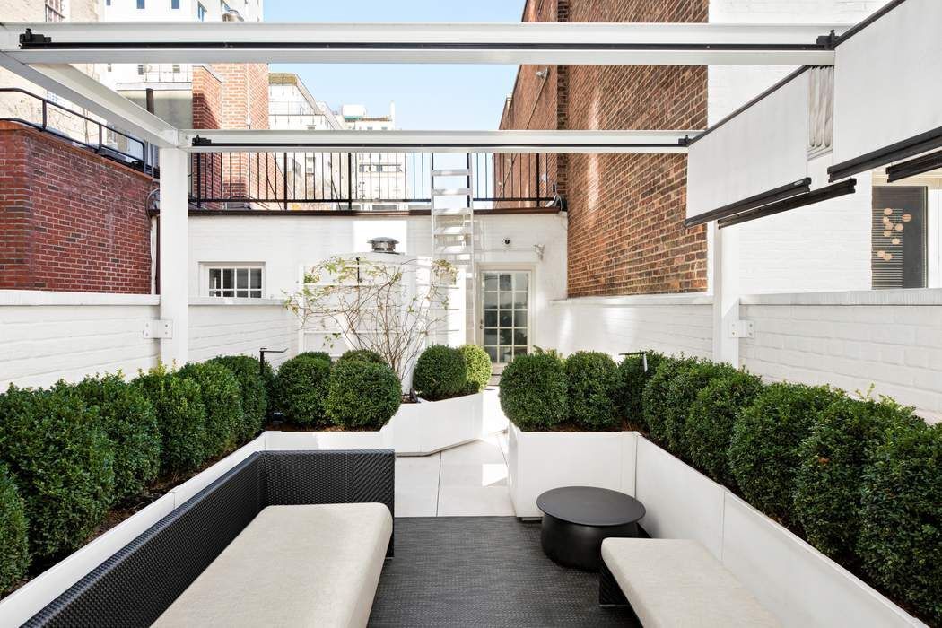 10 East 73rd Street Manhattan, NY 10021 - Photo 15 of 16 a view of balcony with furniture and outdoor space