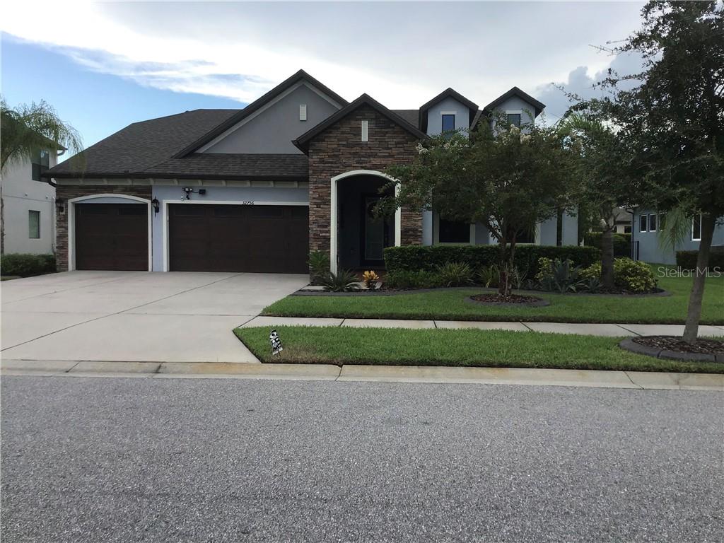 32756 Natural Bridge Road Wesley Chapel, FL 33543 - Photo 1 of 1 Front